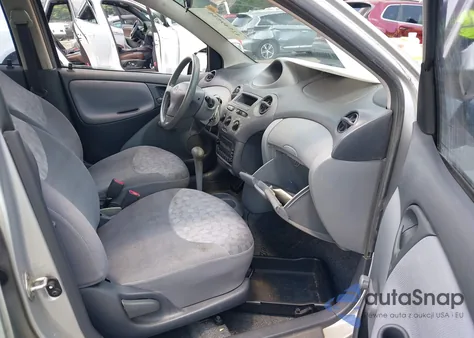 2001 Toyota Echo z USA, uszkodzony, nr VIN JTDBT123510139460